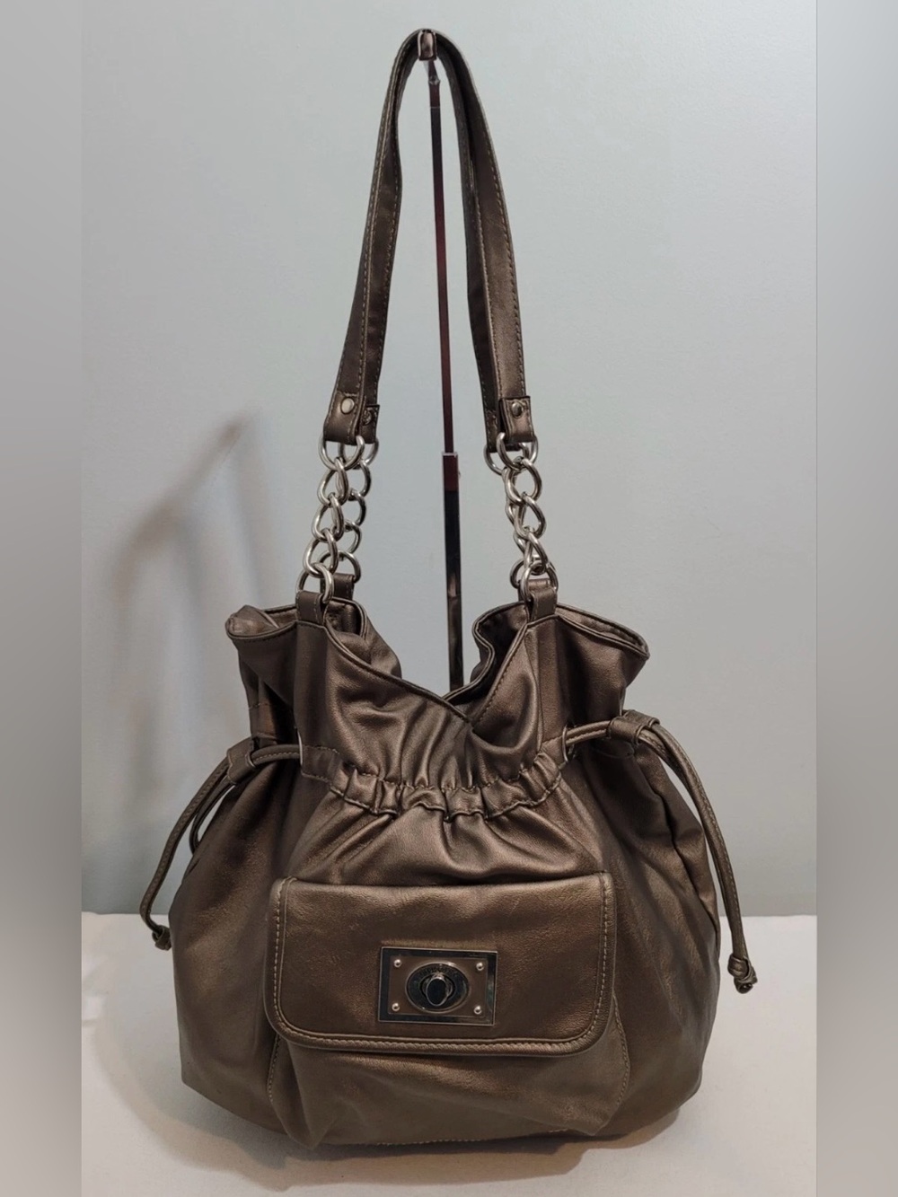 Treviso Metallic Pewter Drawstring Shoulder Bag with Chain Strap Accents